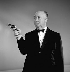 Hitch holding a revolver in a funny way.