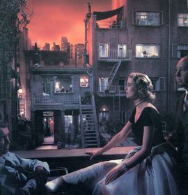 A colored picture of Stewart, Kelly and Hitchcock on the set of Rear Window.